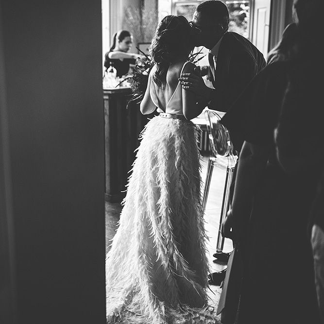 Black and White Portrait of Bride in Charlie Brear Payton Bridal Gown &amp; Piora Feather Skirt