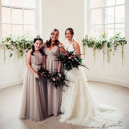 Bridal Party Portrait with Bride in Charlie Brear Payton Bridal Gown &amp; Piora Feather Skirt and Bridesmaids in Dusky Pink Tulle Dresses