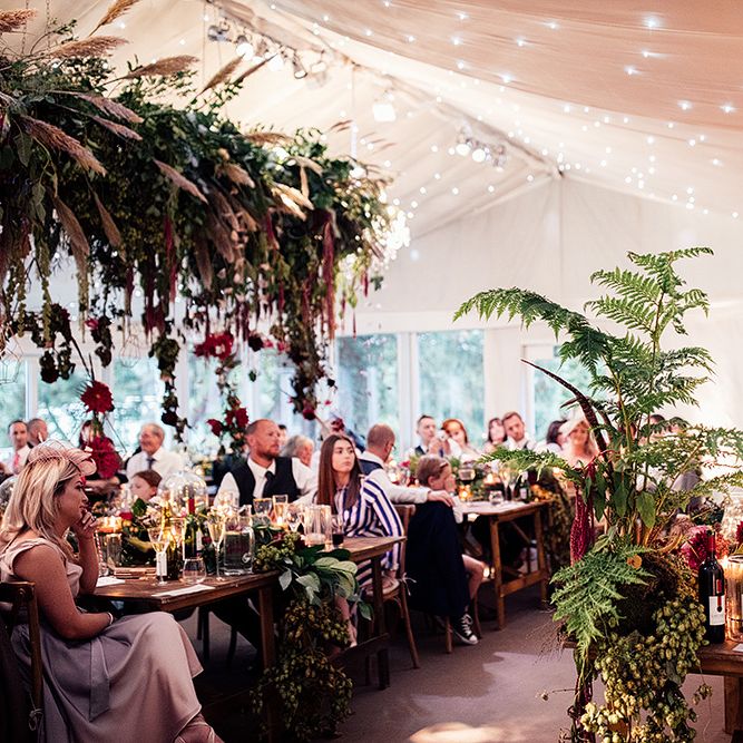 Marquee Reception with Fairy Light Ceiling and Hanging Floral Installation
