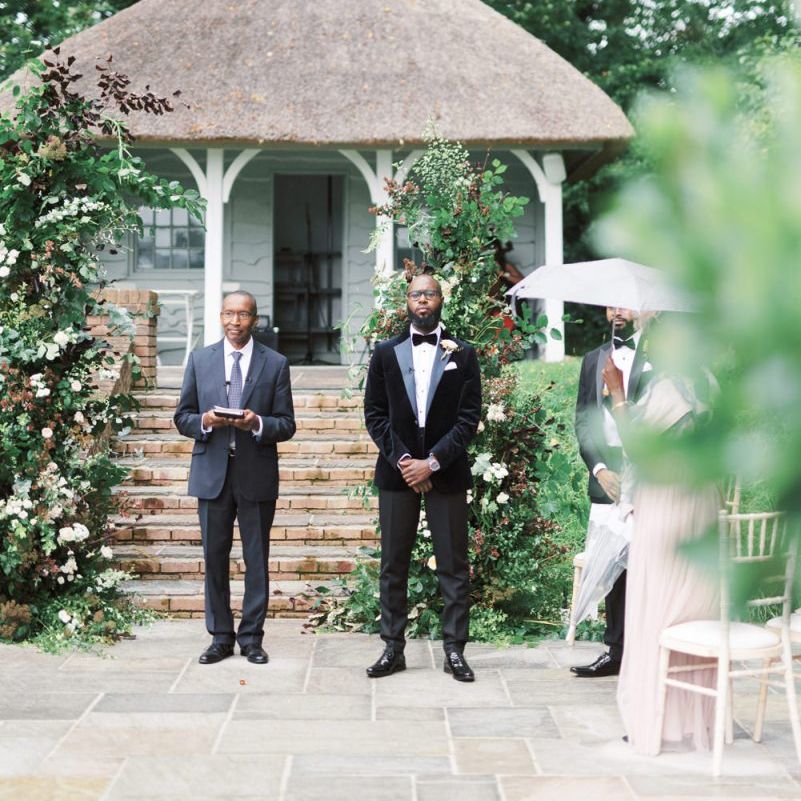 Groom standing at the altar in a tuxedo