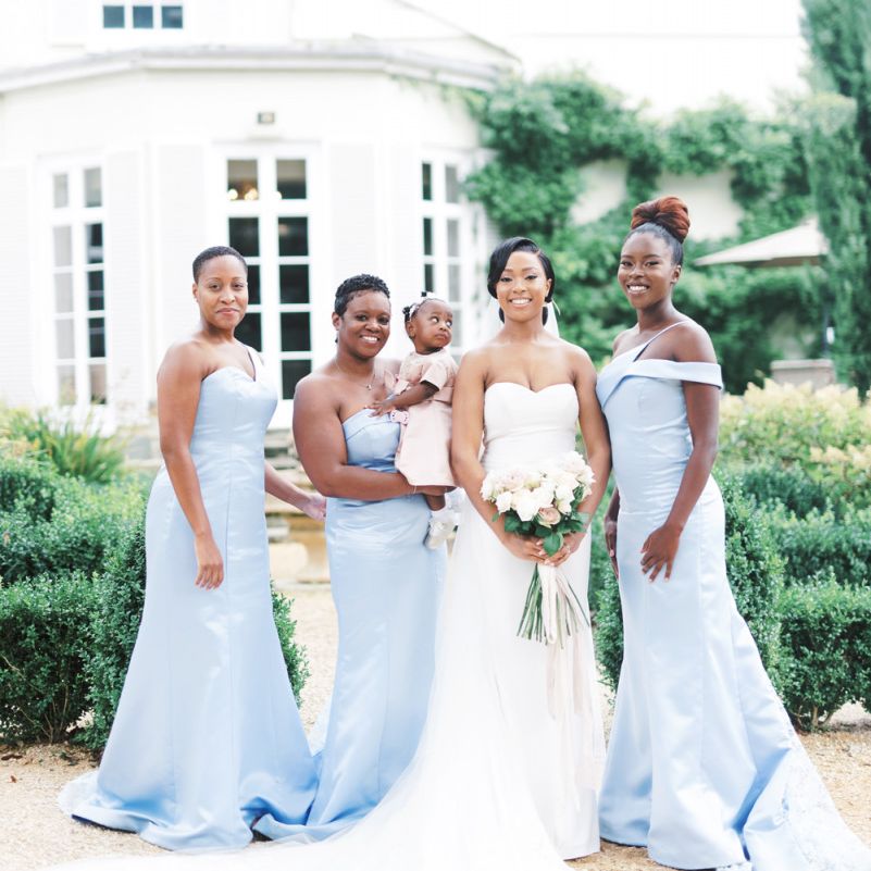 Bridal party with bridesmaids in homemade blue dresses