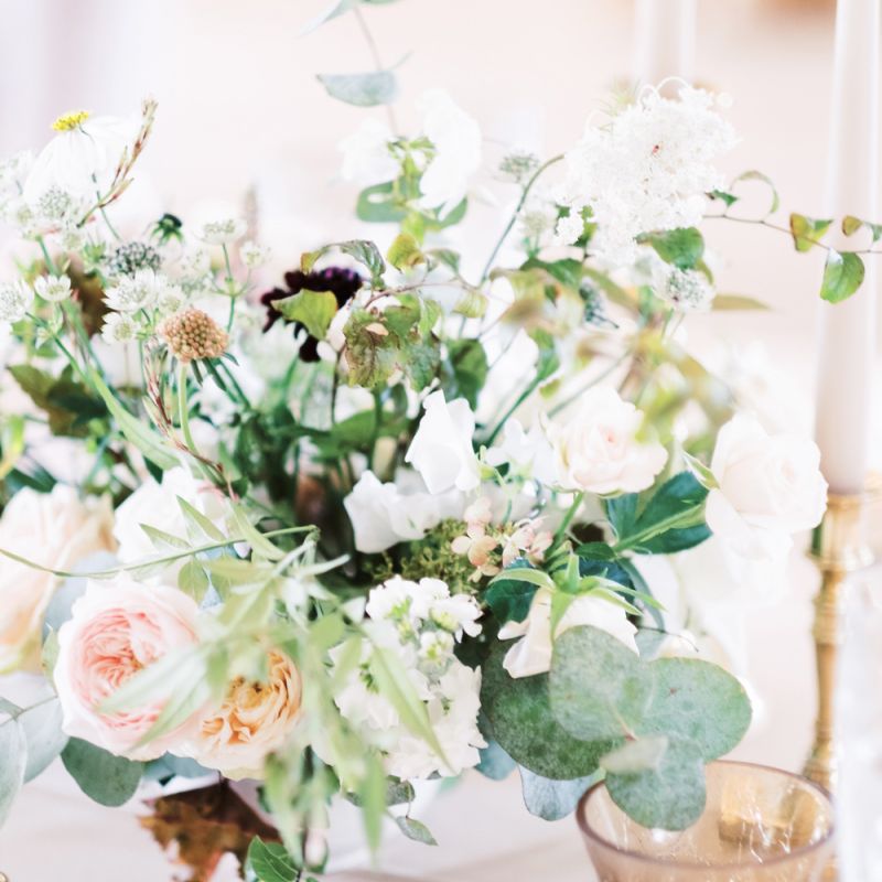 Romantic wedding flower centrepiece and silver votives