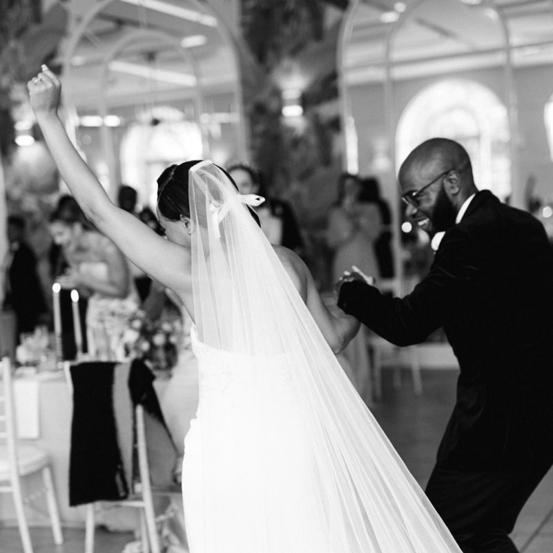 Bride and groom entering the wedding reception