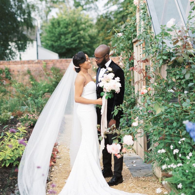 Intimate bride and groom portrait in the gardens at Deer Park Country House
