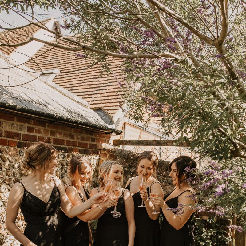 Bridesmaids in black dresses