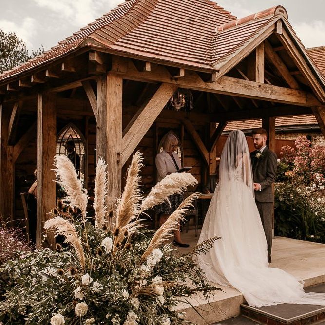 Outdoor wedding ceremony at Southend Barns wedding venue