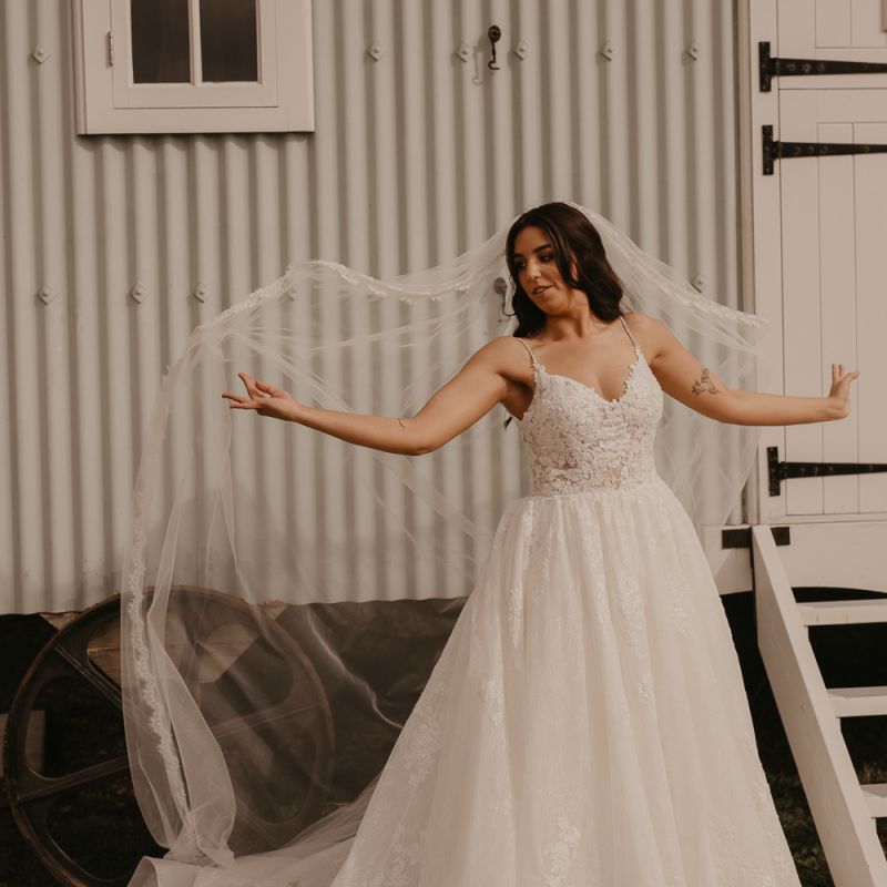 Bride in Enzoani wedding dress at Southend Barns wedding
