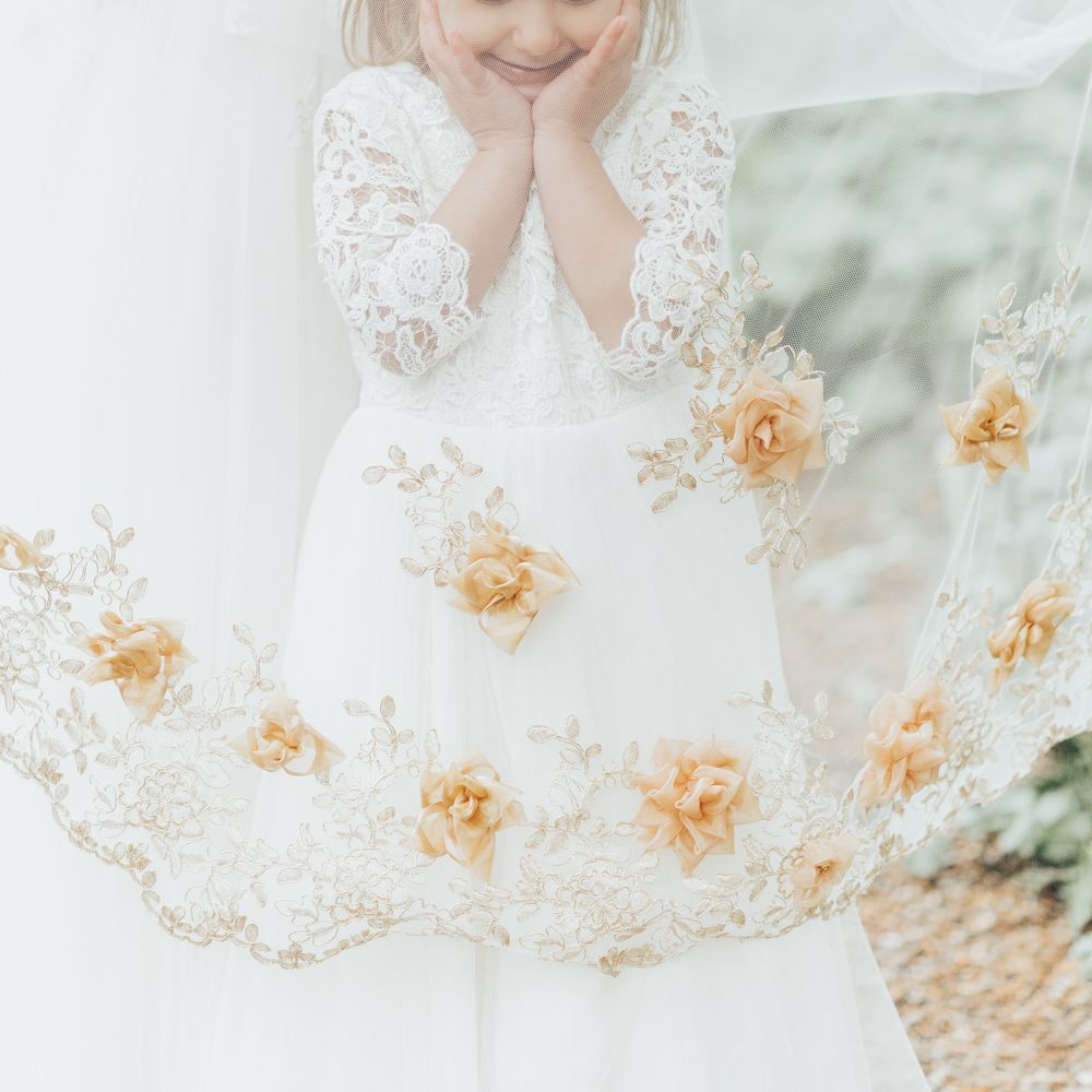 Flower Girl In White Dress // Disney Princess Bride Sleeping Beauty Inspired Wedding With Opulent Florals And Bride In Blush Pink With Images From Rebecca Carpenter Photography