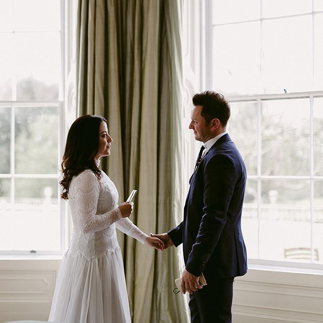 Bride and Groom Saying Their Wedding Vows Next to a Harp