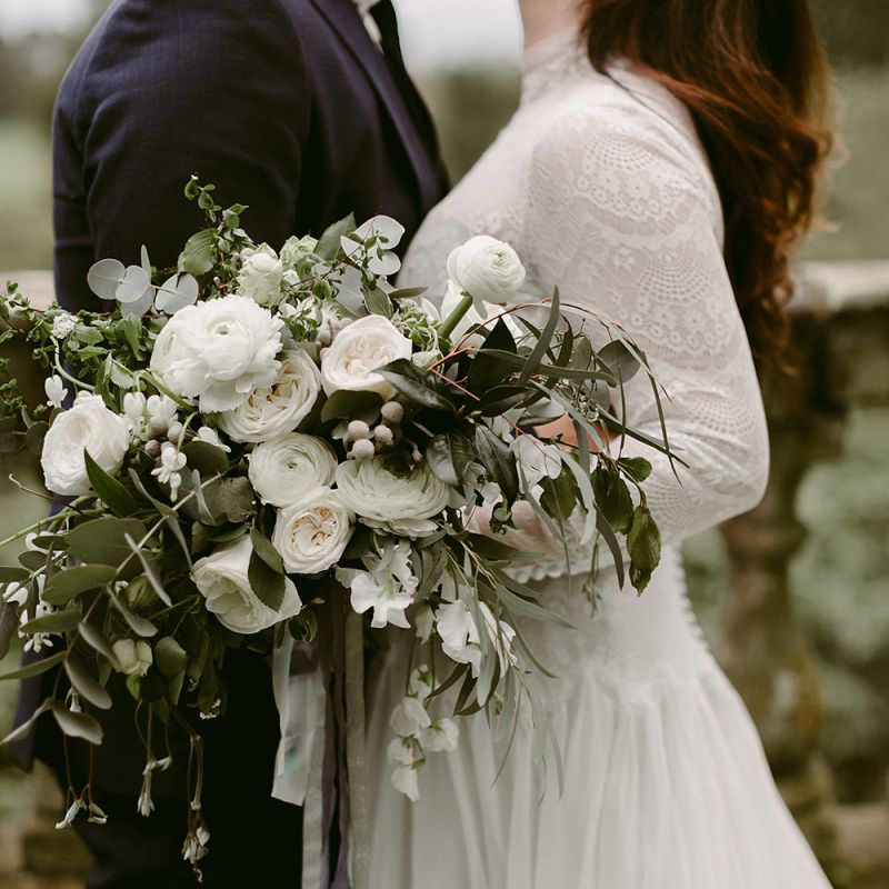White Rose and Ranunculus Bridal Bouquet with Foliage