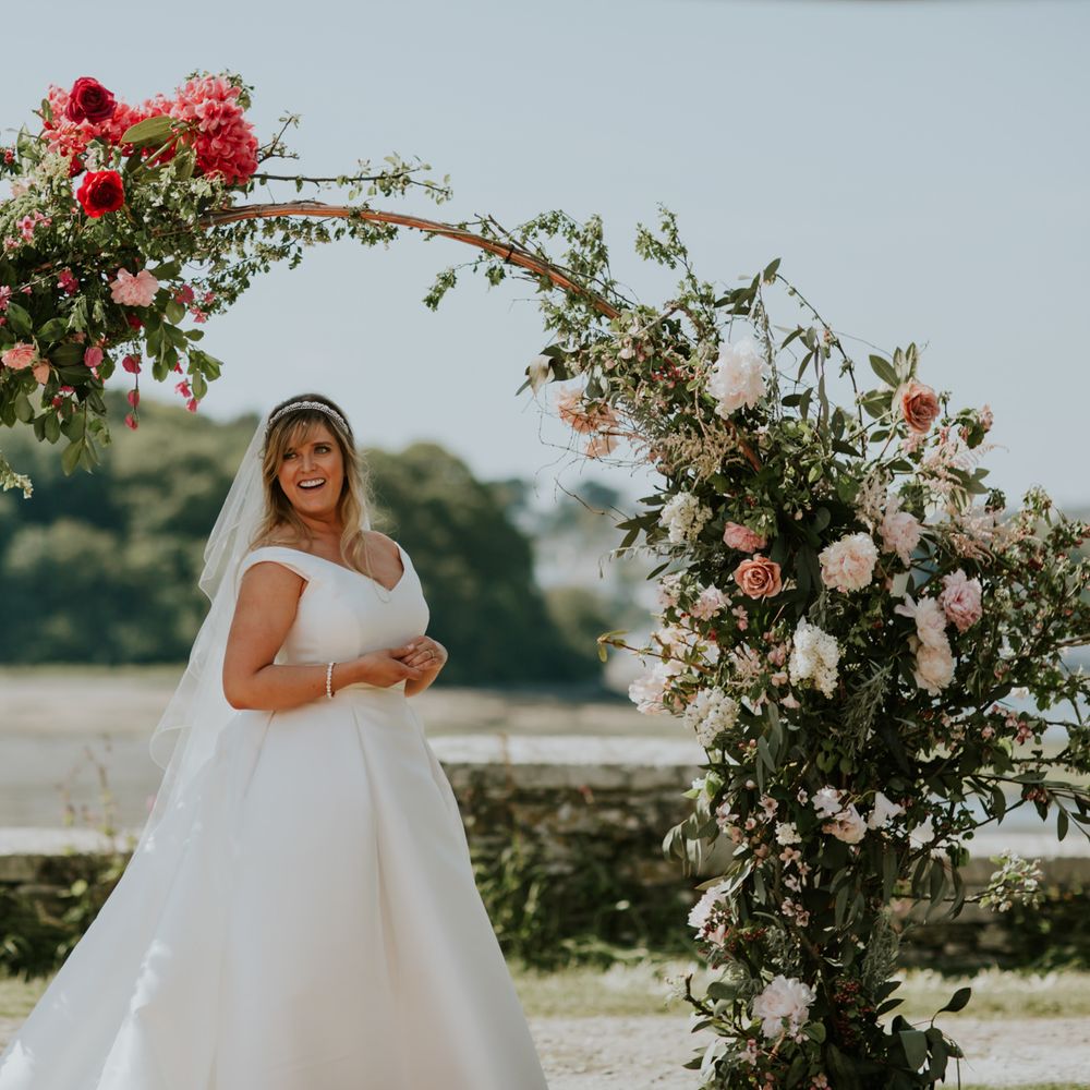 Floral Arch By Flowers With M // Coastal Wedding In St Mawes Cornwall With Food By The Hidden Hut And Planning By Isla And Smith With Images From Enchanted Brides Photography