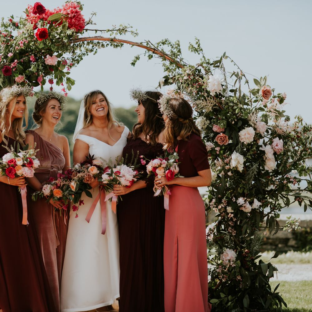Floral Arch By Flowers With M // Coastal Wedding In St Mawes Cornwall With Food By The Hidden Hut And Planning By Isla And Smith With Images From Enchanted Brides Photography
