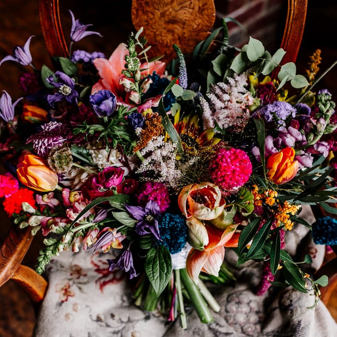 Oversized Colourful Bridal Bouquet | Colourful Alternative Winter Wedding at Upwaltham Barns, Sussex | Epic Love Story Photography