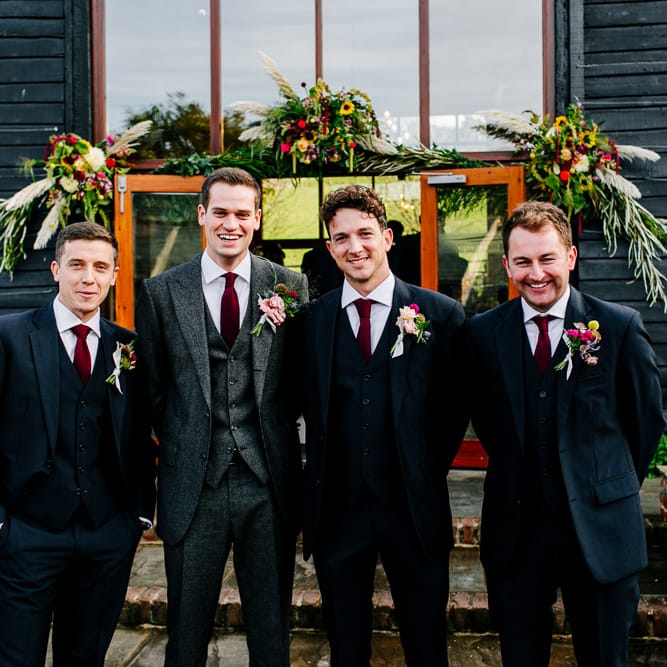 Groomsmen in Suit Supply Suits | Colourful Alternative Winter Wedding at Upwaltham Barns, Sussex | Epic Love Story Photography