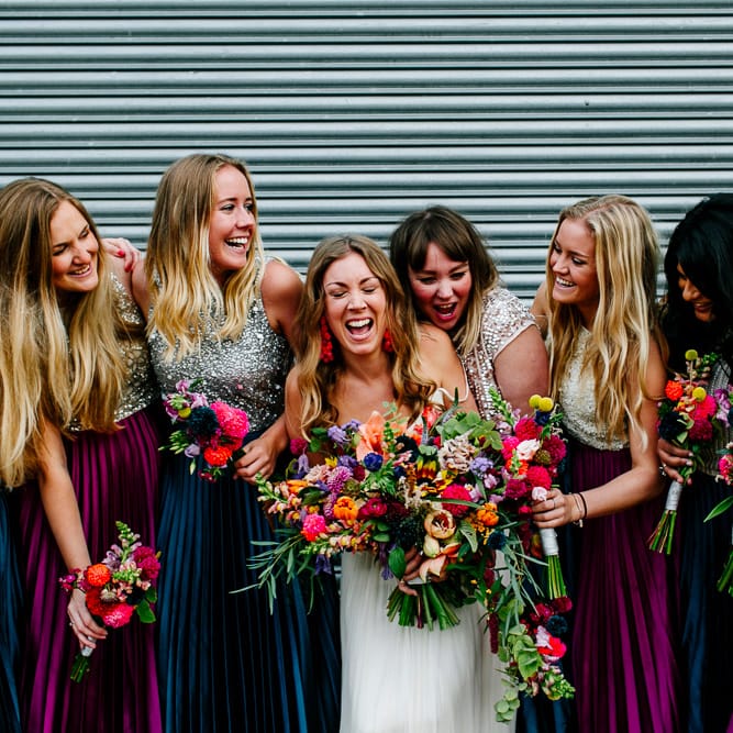 Bridal Party | Bride in Red &amp; White Joanne Fleming Design Wedding Dress | Bridesmaids in Jewel Coloured Skirts &amp; Sequin Top Separates | Colourful Alternative Winter Wedding at Upwaltham Barns, Sussex | Epic Love Story Photography