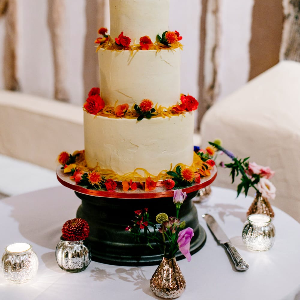 Wedding Cake | Colourful Alternative Winter Wedding at Upwaltham Barns, Sussex | Epic Love Story Photography