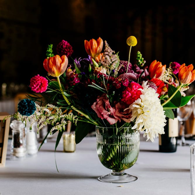 Bright Wedding Floral Arrangement | Colourful Alternative Winter Wedding at Upwaltham Barns, Sussex | Epic Love Story Photography