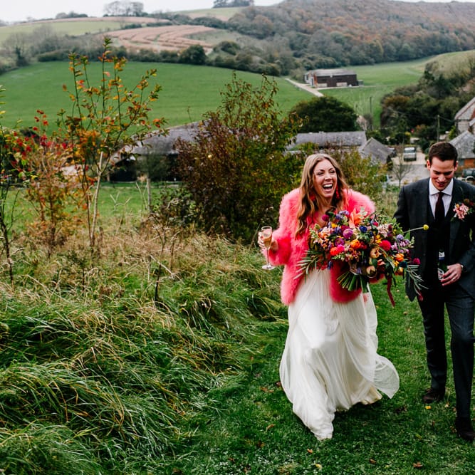 Bride in Red &amp; White Joanne Fleming Design Wedding Dress | Groom in Suit Supply Suit | Colourful Alternative Winter Wedding at Upwaltham Barns, Sussex | Epic Love Story Photography