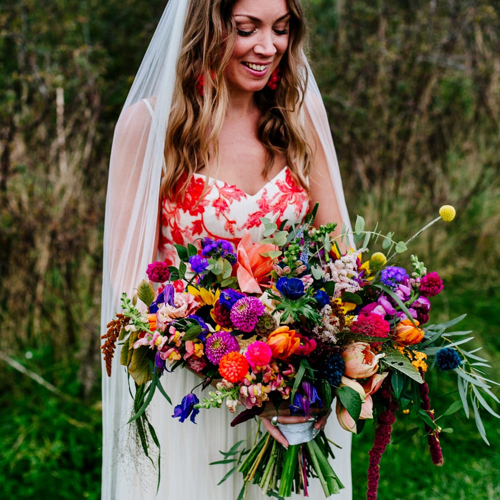 Bride in Red &amp; White Joanne Fleming Design Wedding Dress | Colourful Alternative Winter Wedding at Upwaltham Barns, Sussex | Epic Love Story Photography
