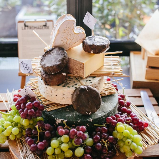 Cheese Tower For Wedding // Stylish Rooftop Wedding At Ace Hotel Shoreditch // Image By Story Wedding Photography // Bride In Catherine Deane // Bobbi Brown Bridal