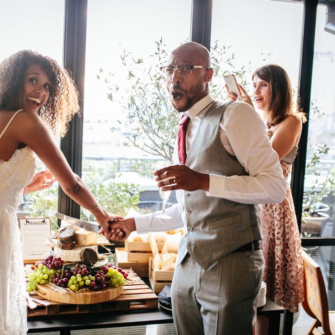 Cheese Tower For Wedding // Stylish Rooftop Wedding At Ace Hotel Shoreditch // Image By Story Wedding Photography // Bride In Catherine Deane // Bobbi Brown Bridal
