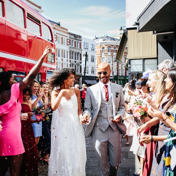 Red Routemaster Bus Wedding Transport // Stylish Rooftop Wedding At Ace Hotel Shoreditch // Image By Story Wedding Photography // Bride In Catherine Deane // Bobbi Brown Bridal