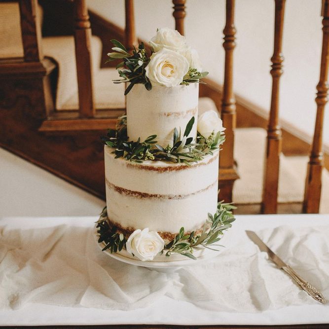 White Semi Naked Buttercream Wedding Cake / Image By Ali Paul Photography