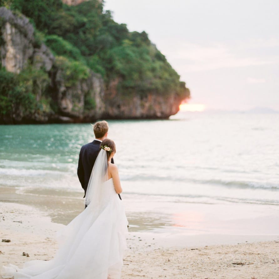 Intimate wedding portrait on a Thailand beach for tropical wedding