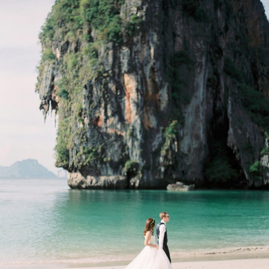 Bride and groom beach portrait
