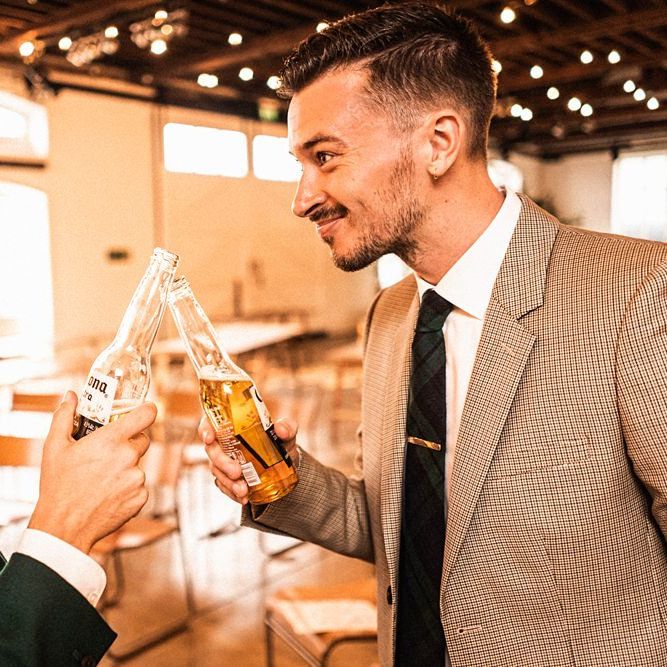 Grooms toast their wedding at  Trinity Buoy Wharf