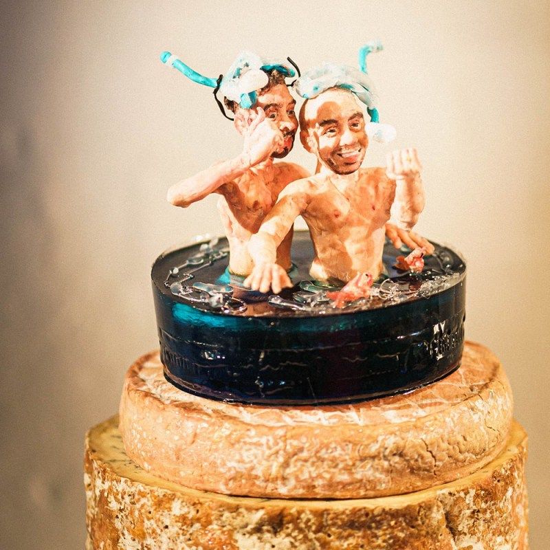 Wedding cake with groom cake toppers