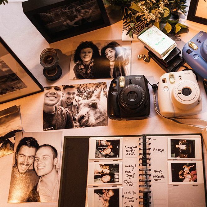 Polaroid camera table at wedding