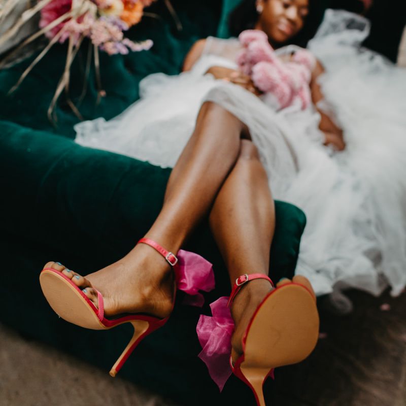 Pink and red wedding shoes with bows