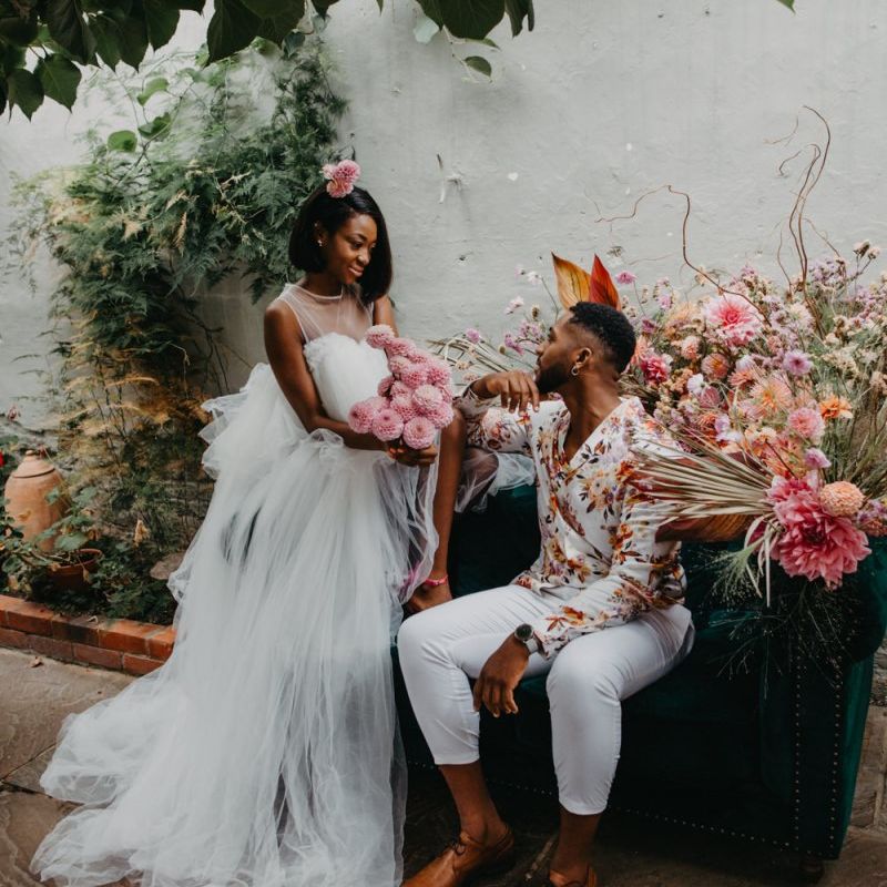 Bride and groom at tropical wedding inspiration at Secret Garden Kent
