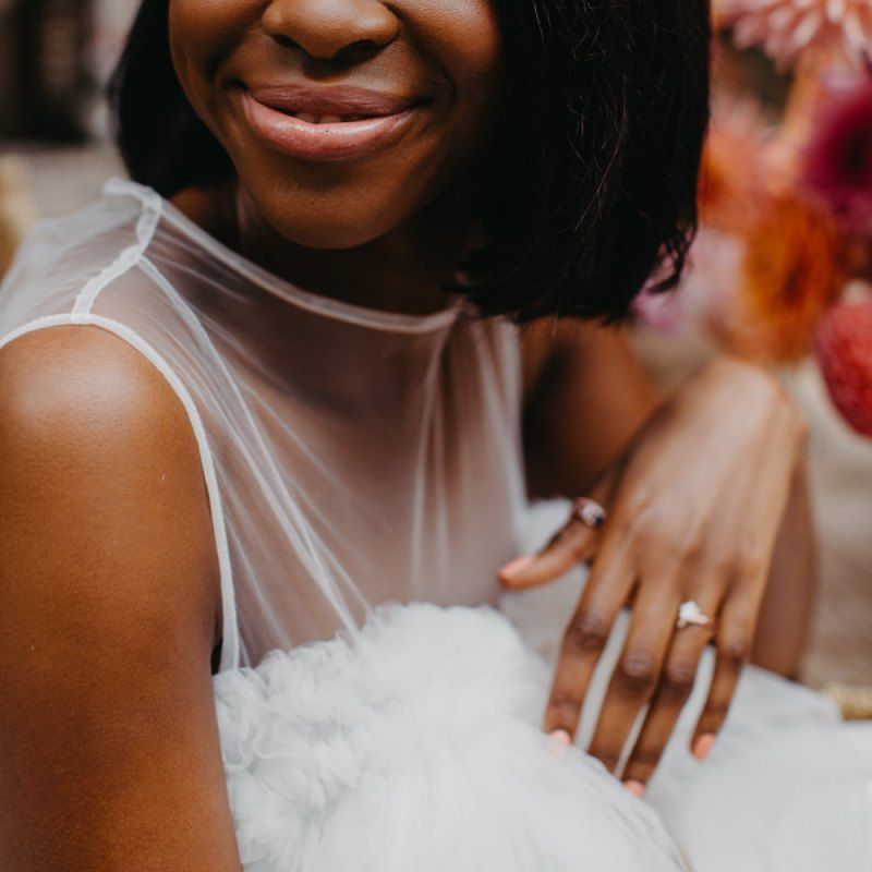 Beautiful bridal makeup with pink lipstick and eyeliner