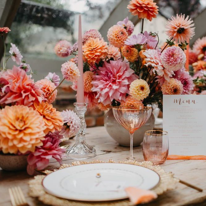 Colourful wedding flower centrepieces and details for intimate wedding at Secret Garden Kent