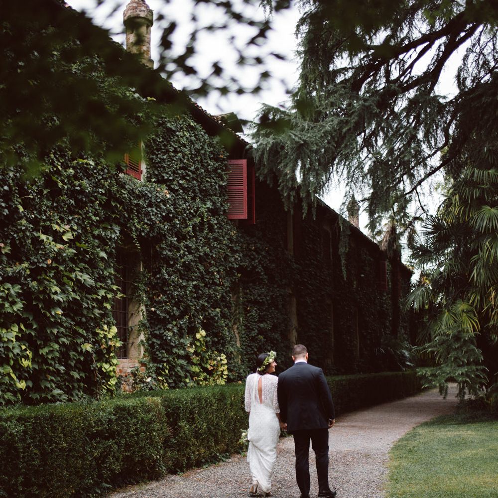 Bride in Laure De Sagazan Gown | Groom in Black Suit | Green &amp; White Bohemian Wedding in the Rain at Castello di San Sebastiano da Po, Italy | Margherita Calati Photography | Second Shooter Carlo Vittorio