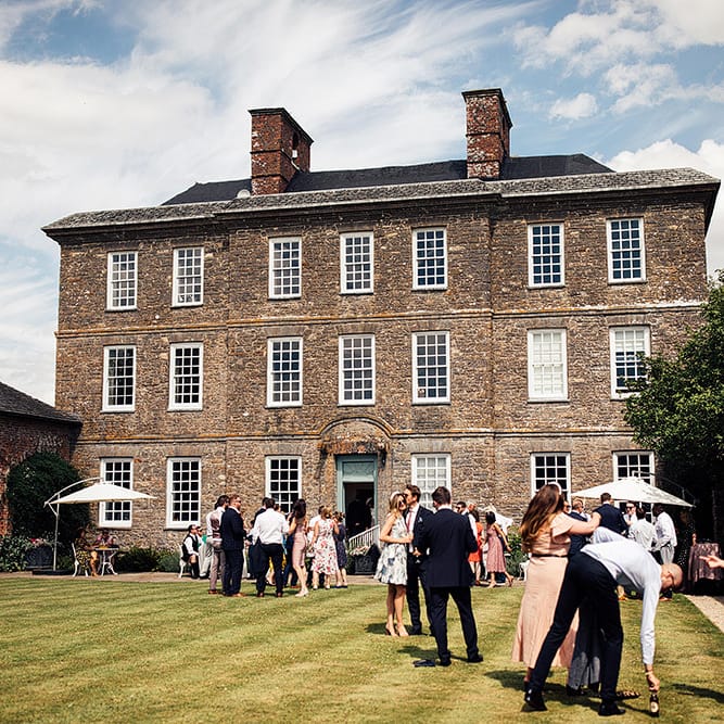 Kingston Estate wedding venue in Devon with outdoor wedding first dance moment