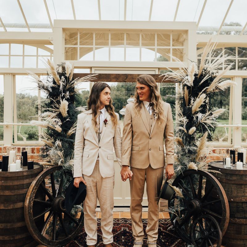 western wedding ideas with two grooms in light suits