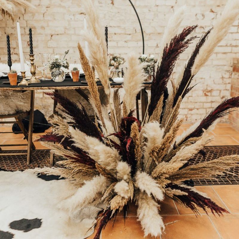 western wedding floral arrangement with pampas grass stems