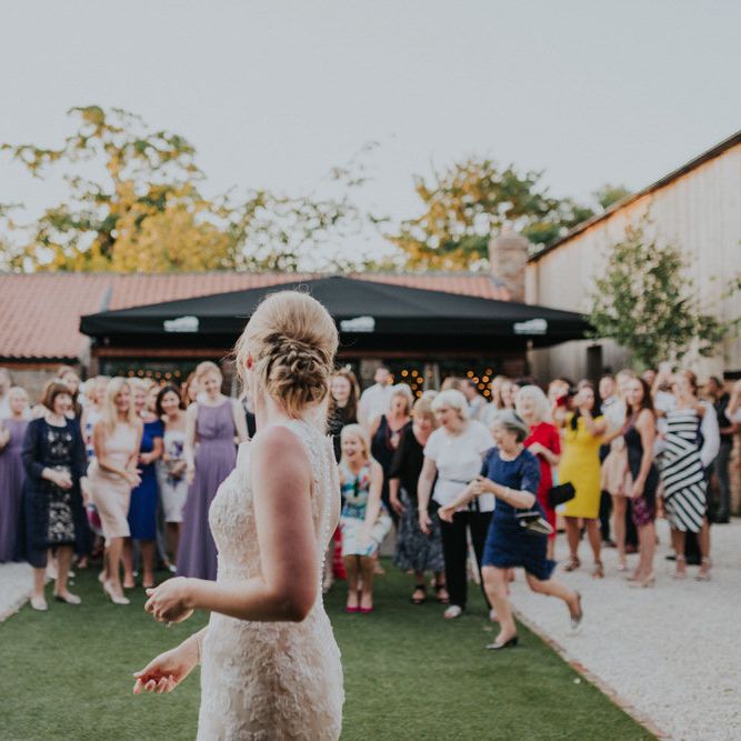 Bride Throwing her Bouquet