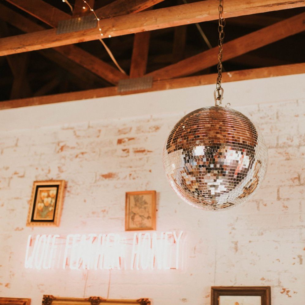 Disco ball for vegas elopement with sparkly wedding dress