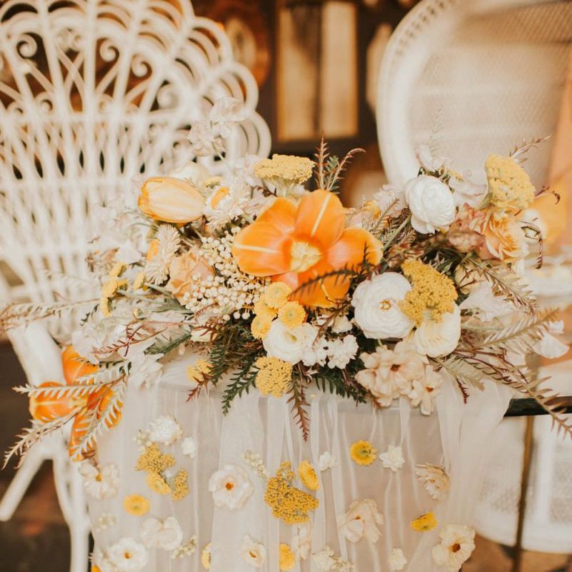 Sheer table cloth with flowers attached for vegas elopement
