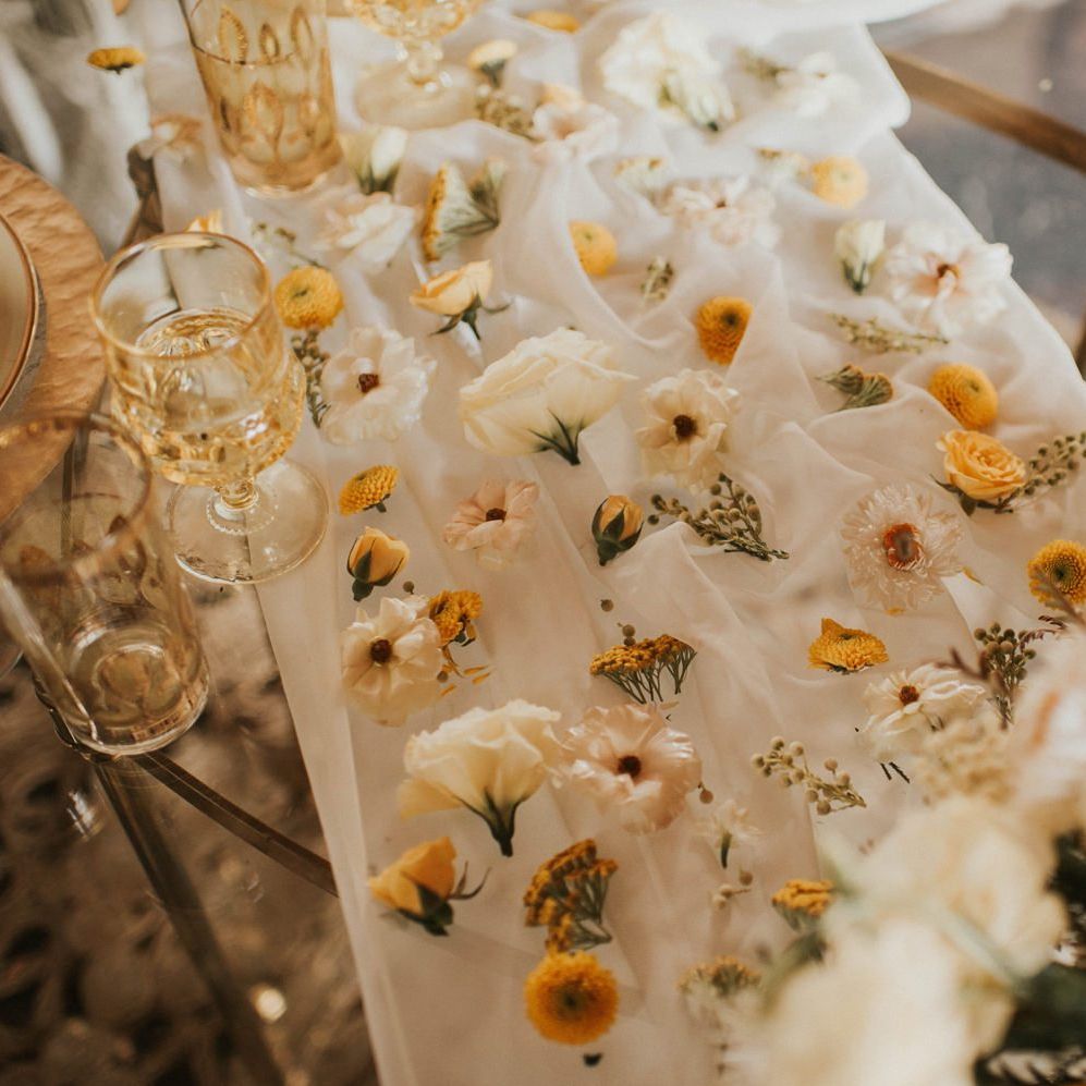 Flower table runner for Vegas Elopement with sparkly wedding dress