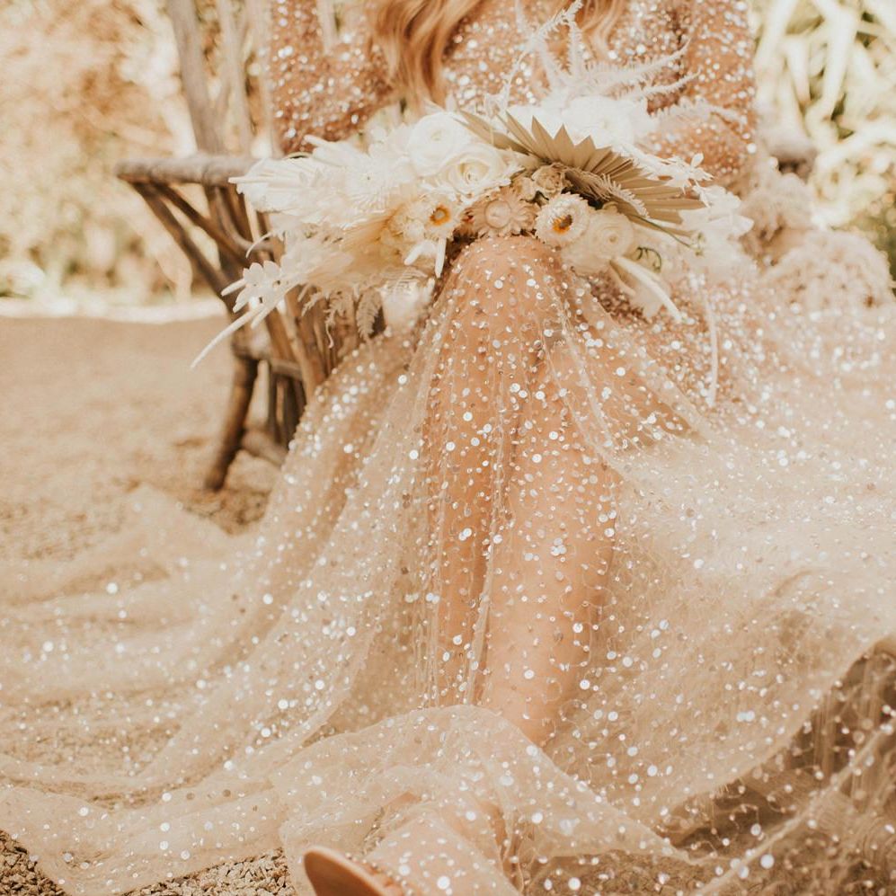 Boho bride in sparkly wedding dress