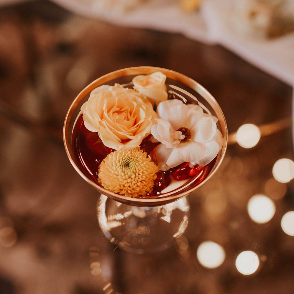 Champagne Saucer willed with flower heads