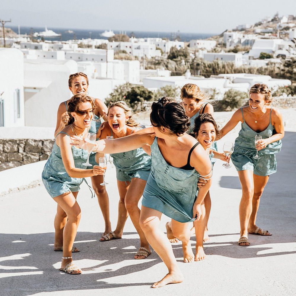 Bridal party in matching pyjamas during preparations in Mykonos
