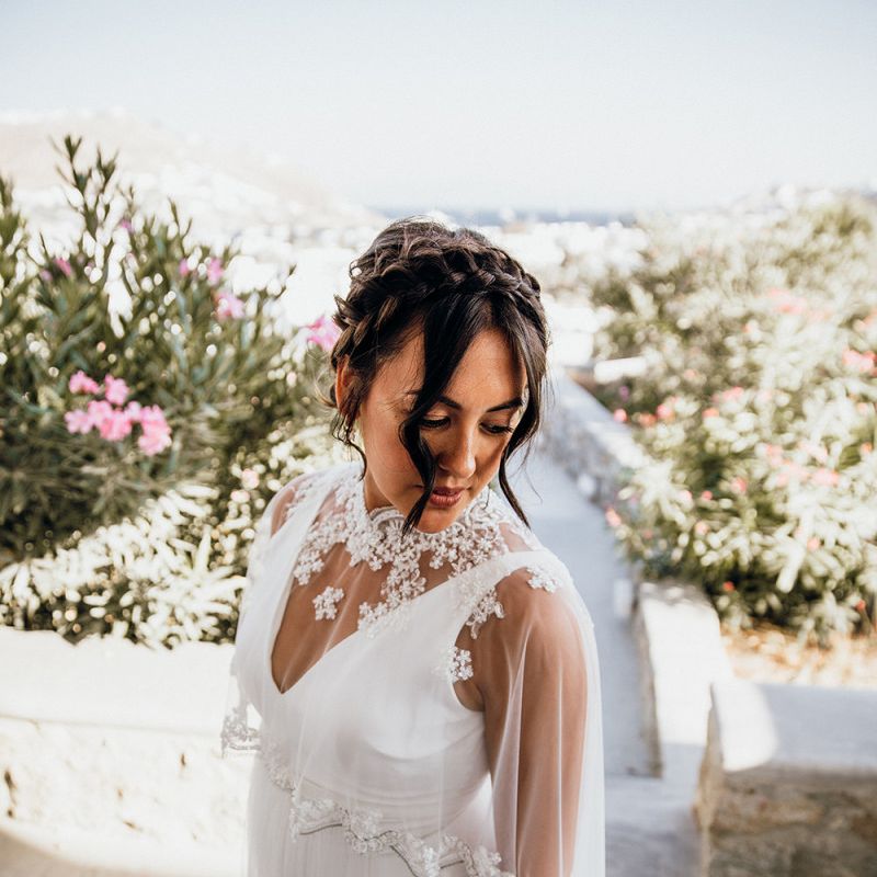 Bride in wedding capelet with Pronovias bride dress