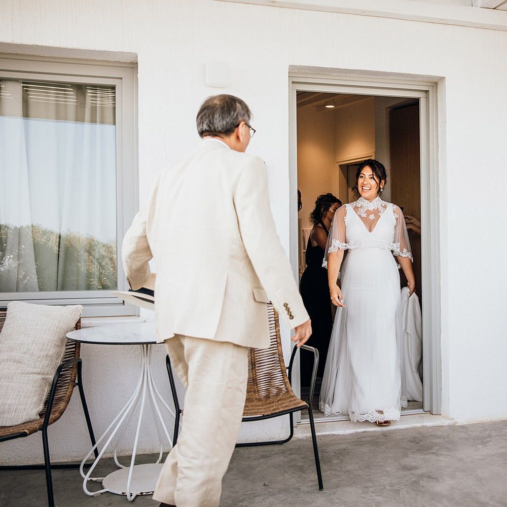 Bride appears in wedding capelet