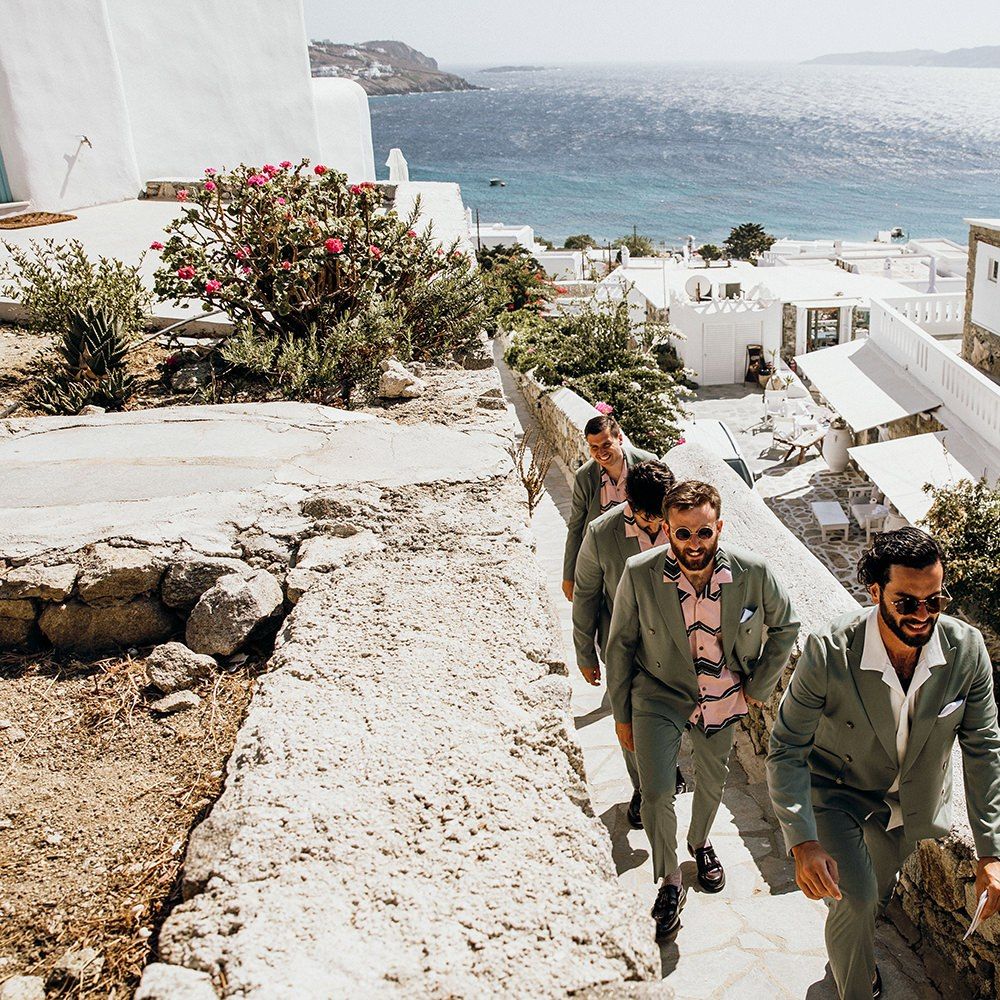Groom with groomsmen at destination wedding in Mykonos
